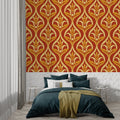 Art nouveau wallpaper with terracotta and gold florals in a modern living room setting