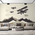 Aviation wallpaper in modern living room showing vintage planes and mountains creating depth and movement