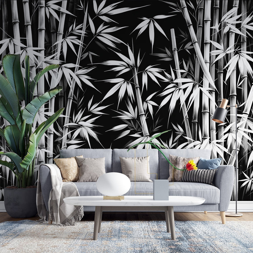 Black and white bamboo forest wallpaper creating depth in a modern minimalist living room with clean lines and natural light