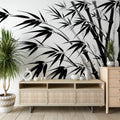 Black and white bamboo wallpaper creating a peaceful zen atmosphere in a modern minimalist living room