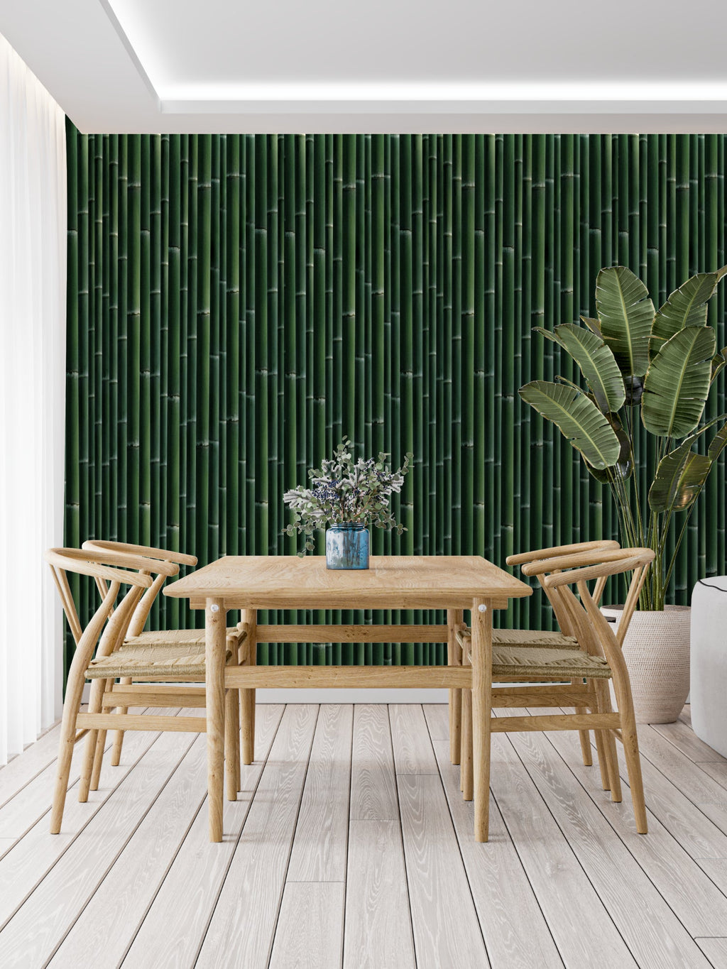 Green bamboo wallpaper adding depth to a minimalist dining space