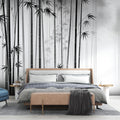 Black and white Bamboo Forest Wallpaper creating a stunning feature wall in a modern living room with minimalist furniture