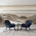 Beach landscape wallpaper creating a serene atmosphere in a modern living room with natural light and minimal furniture