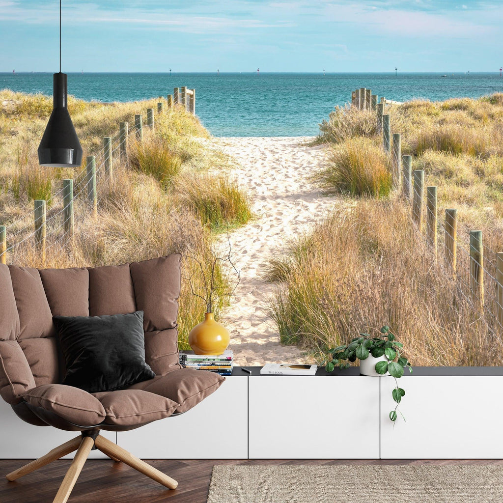 Coastal beach wallpaper adding depth to a minimalist dining room space