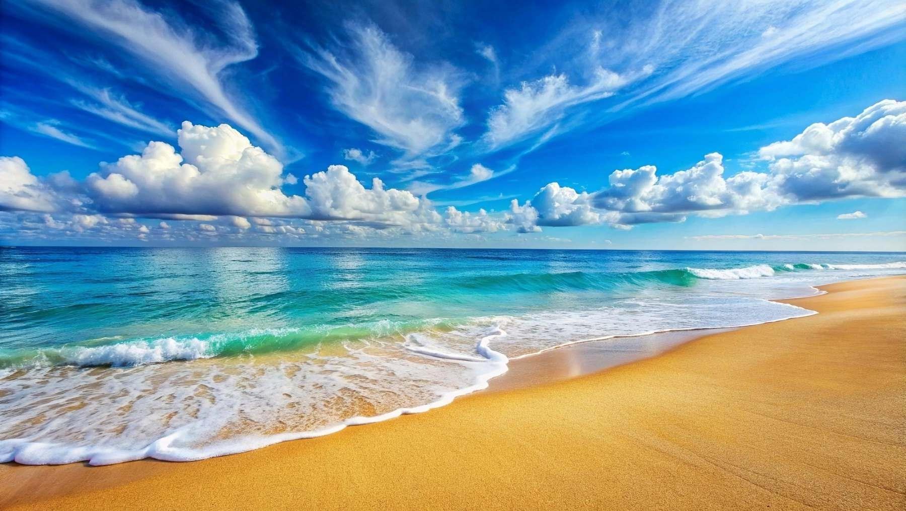 Turquoise ocean and golden sand beach wallpaper design file showing detailed waves and pristine shore