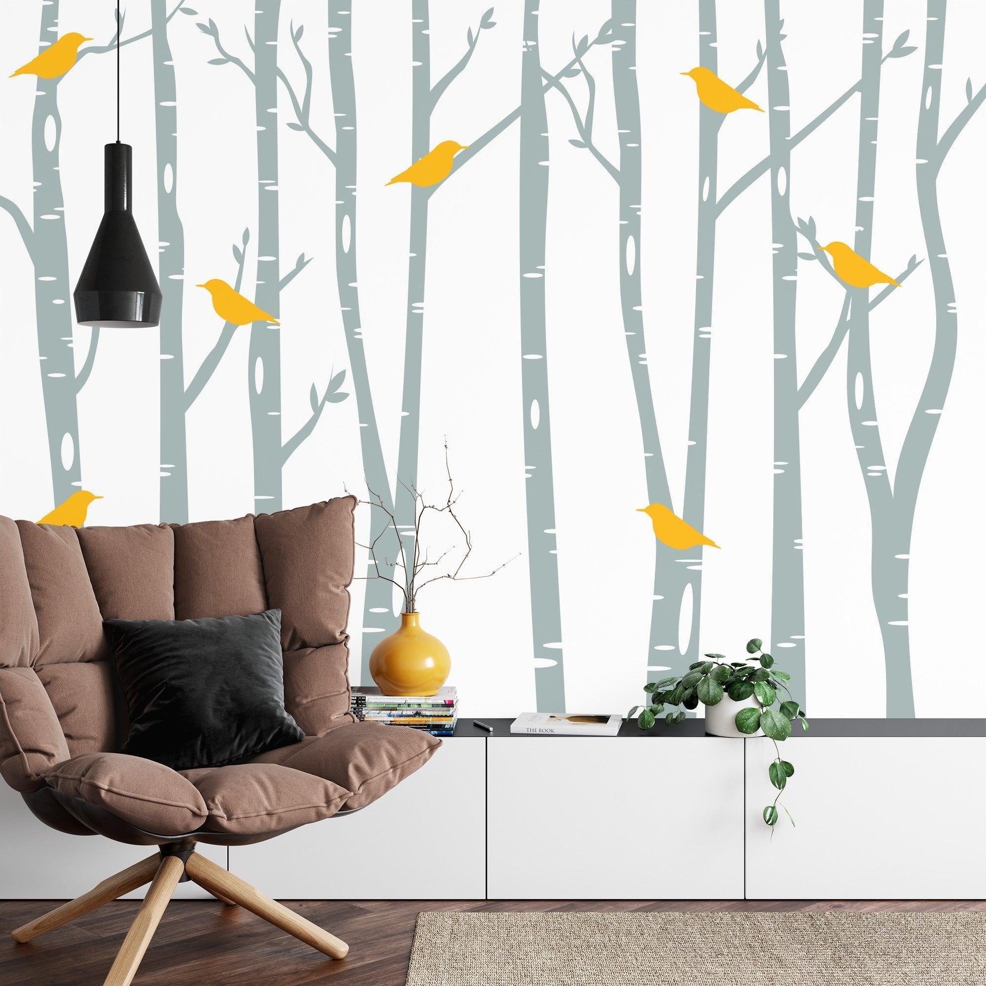 Birch tree wallpaper making a statement in a minimalist bedroom