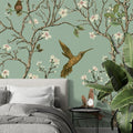 Birds wallpaper mural with cherry blossoms and hummingbirds creating a peaceful atmosphere in a bright living room