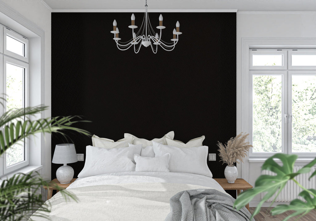 Black geometric wallpaper in modern living room creating dramatic accent wall