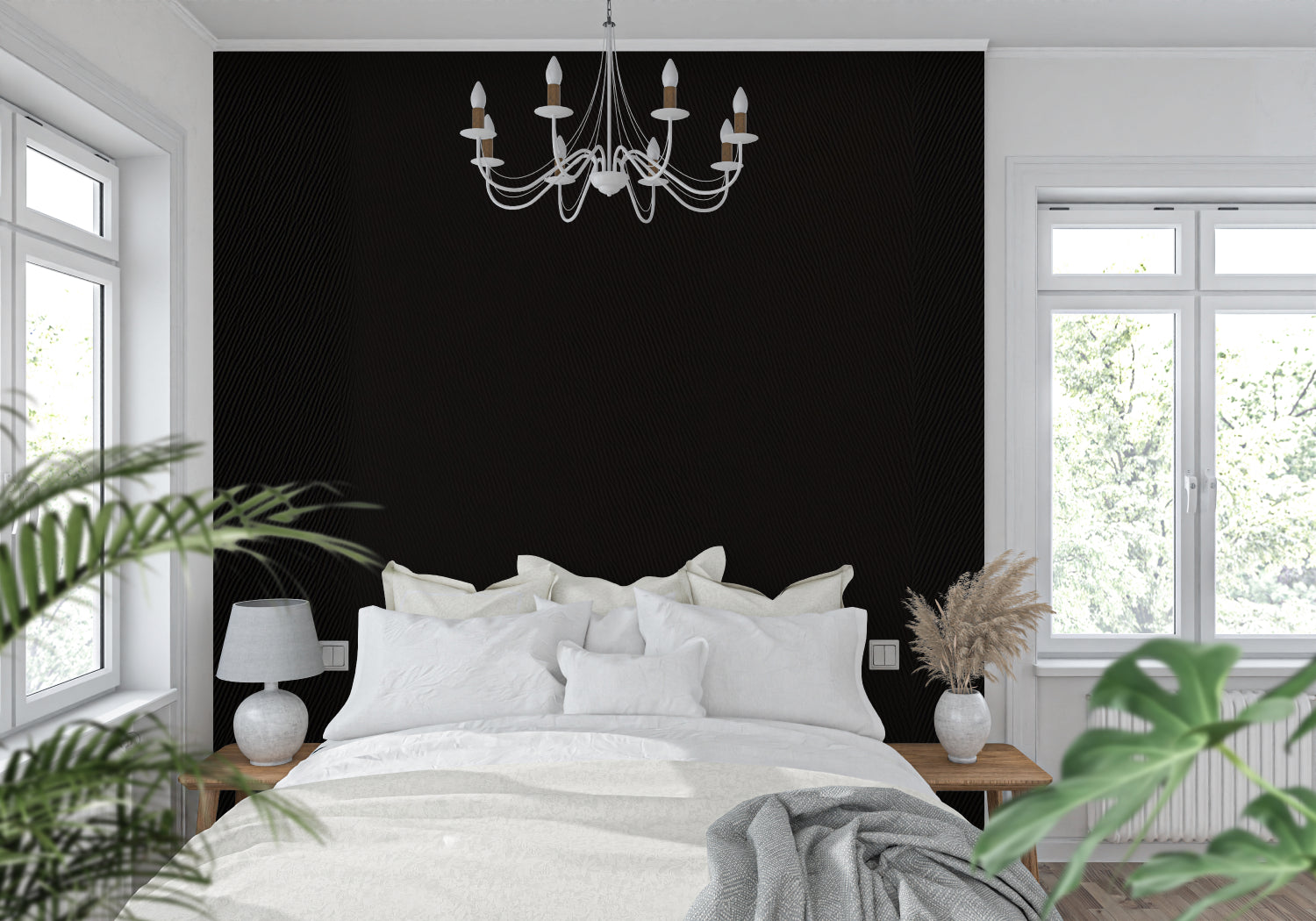 Black geometric wallpaper in modern living room creating dramatic accent wall