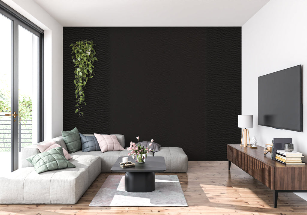 Modern office space featuring black geometric wallpaper with diagonal lines