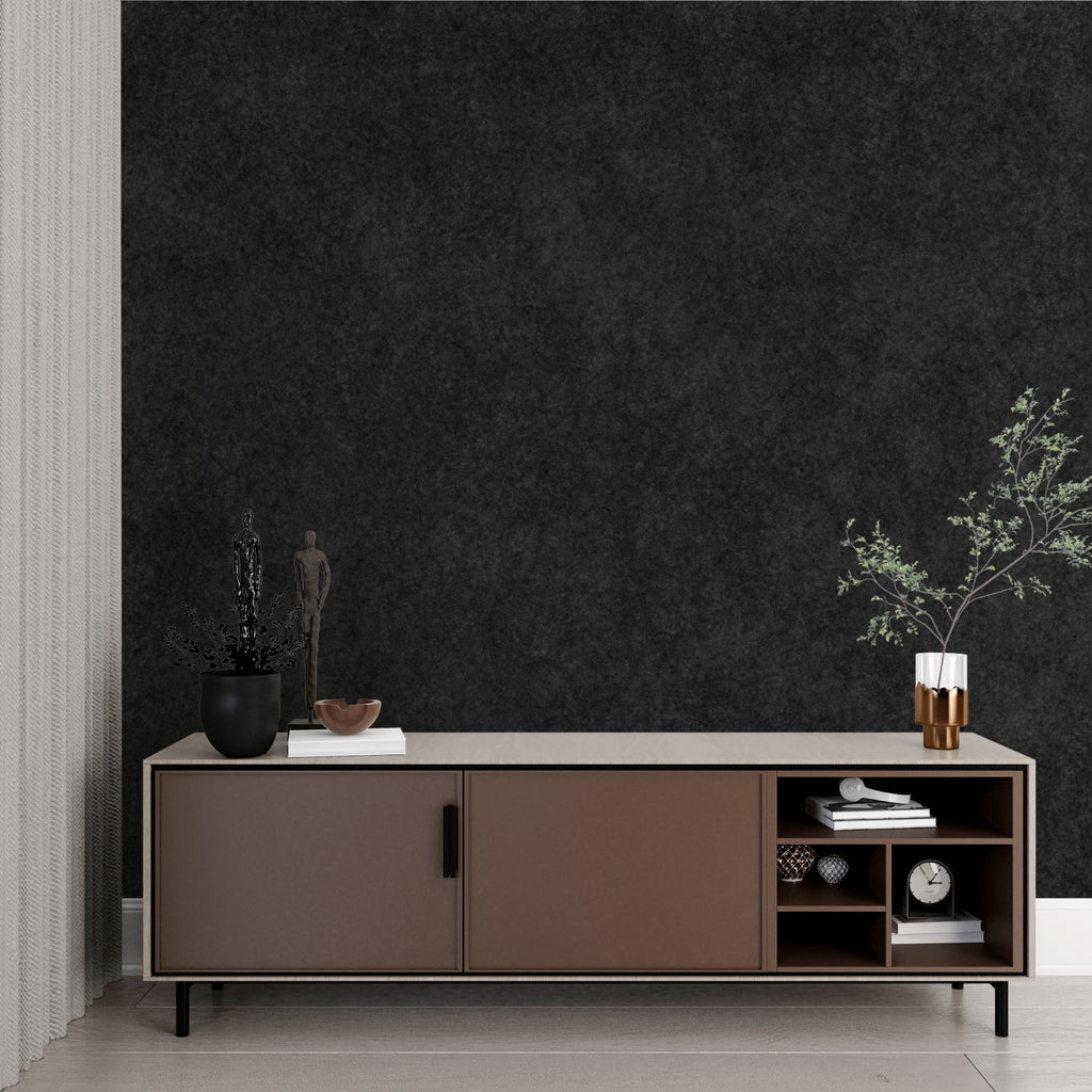Black velvet wall covering in a stylish dining room with gold accents