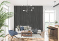 Black wood wallpaper in modern living room creating an elegant accent wall with vertical pattern