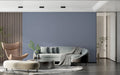 Modern grey wallpaper in bright Scandinavian living room with minimal furniture