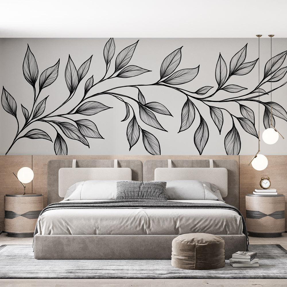 Black and white botanical line art wallpaper in a bright modern living room, creating a sophisticated art gallery atmosphere