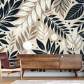 Black and beige botanical wallpaper in modern living room with natural light