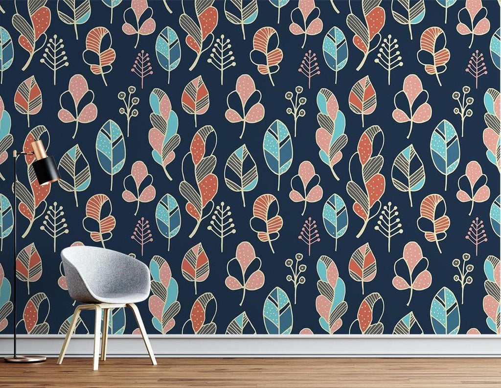 Navy and coral feather pattern mural creates a stunning backdrop in a modern home office