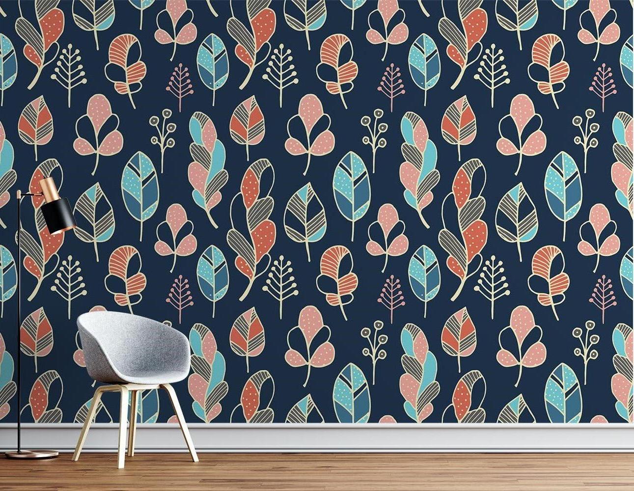 Navy and coral feather pattern mural creates a stunning backdrop in a modern home office
