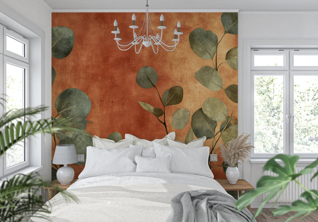 Botanical wallpaper with eucalyptus leaves in modern living room with gray sofa and natural light
