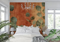 Botanical wallpaper with eucalyptus leaves in modern living room with gray sofa and natural light
