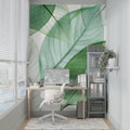 Botanical leaf wallpaper creating a fresh atmosphere in a modern living room with natural light