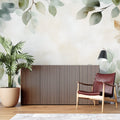Botanical wallpaper mural creating a peaceful atmosphere in a modern living room with natural light