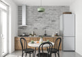 Grey brick wallpaper in modern living room showing industrial style and texture