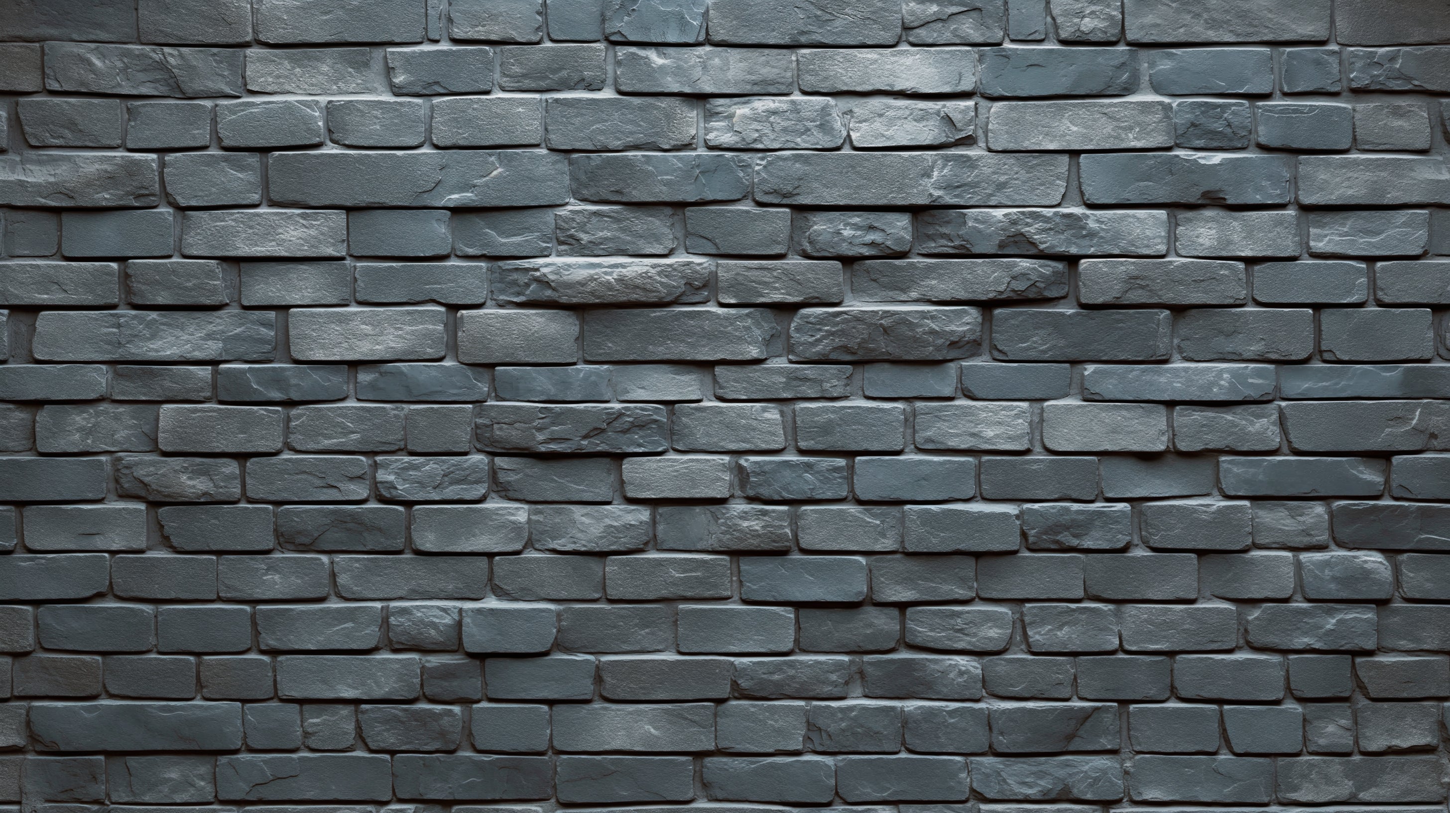Grey brick mural wallpaper creating an industrial look in a modern living room with leather sofa