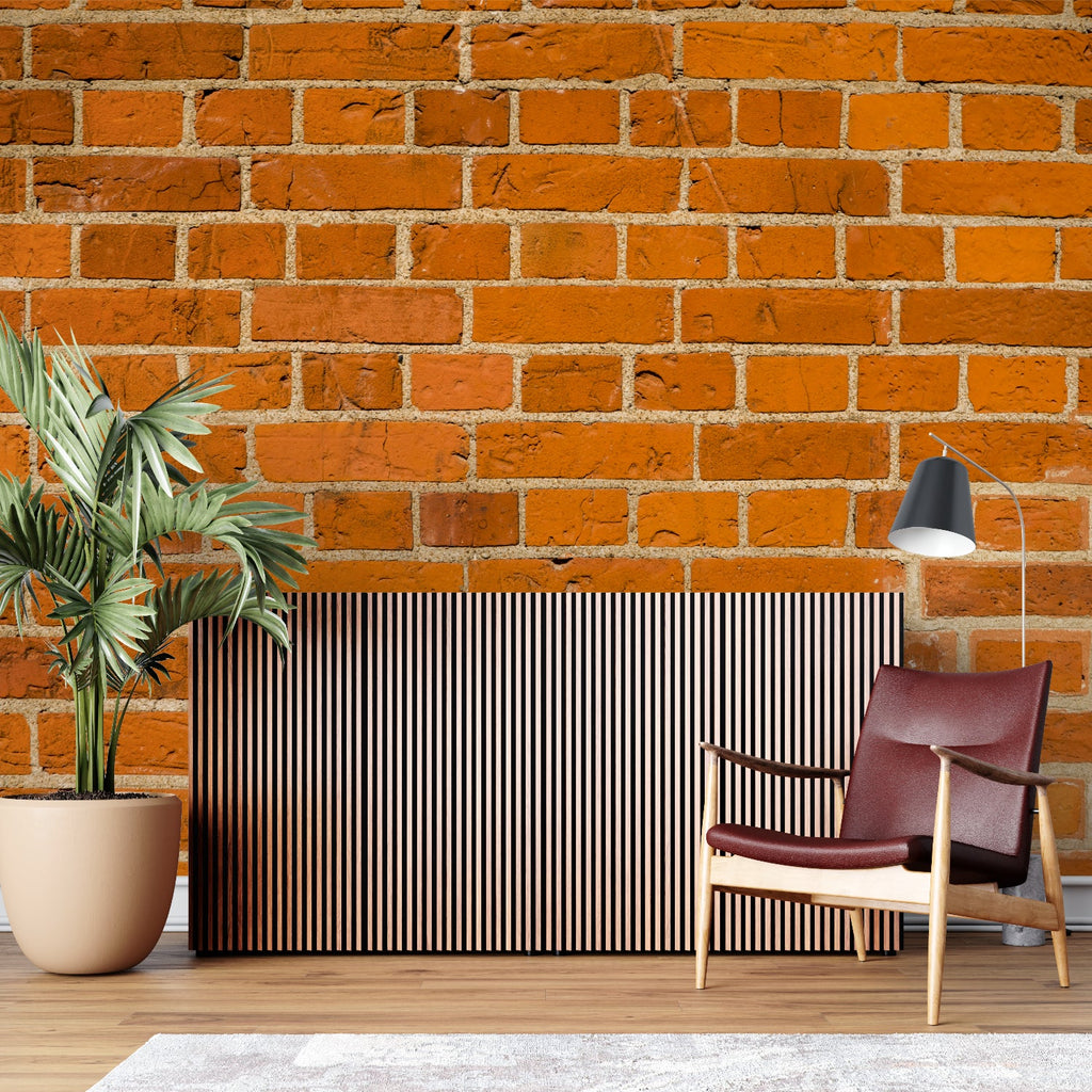 Orange brick wallpaper in modern living room showing industrial style and warm lighting
