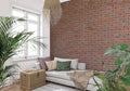 Red brick wall mural in modern living room with grey sofa and industrial lighting