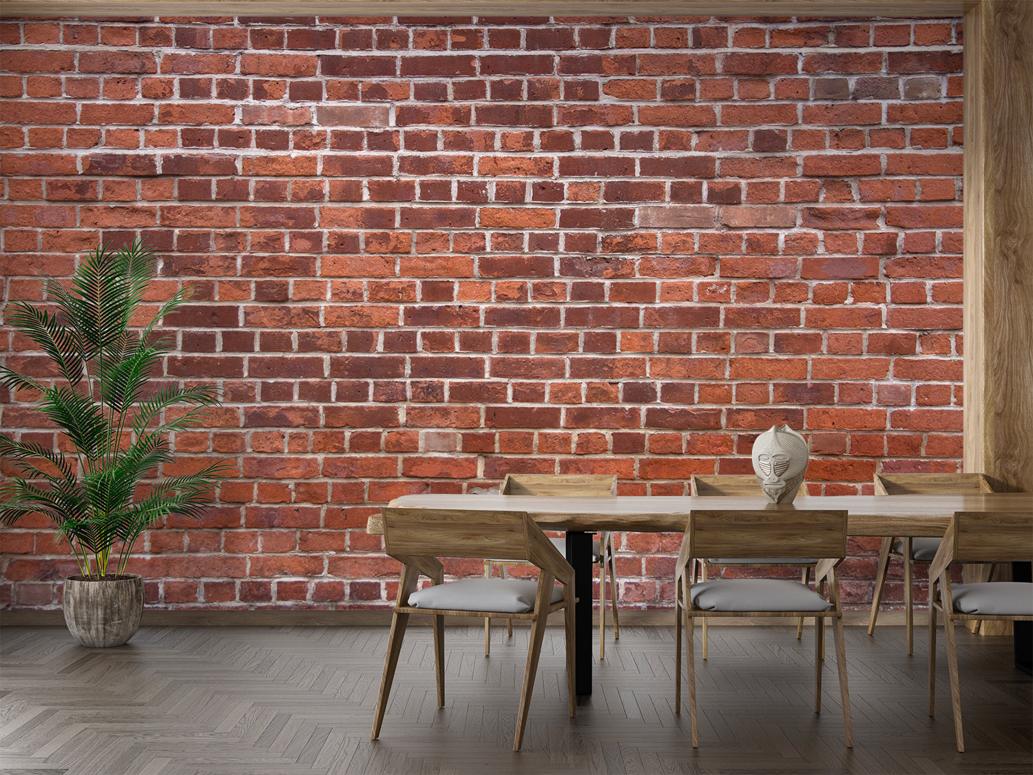 Red brick wallpaper creating an industrial accent wall in a modern living room with tall windows and concrete floors