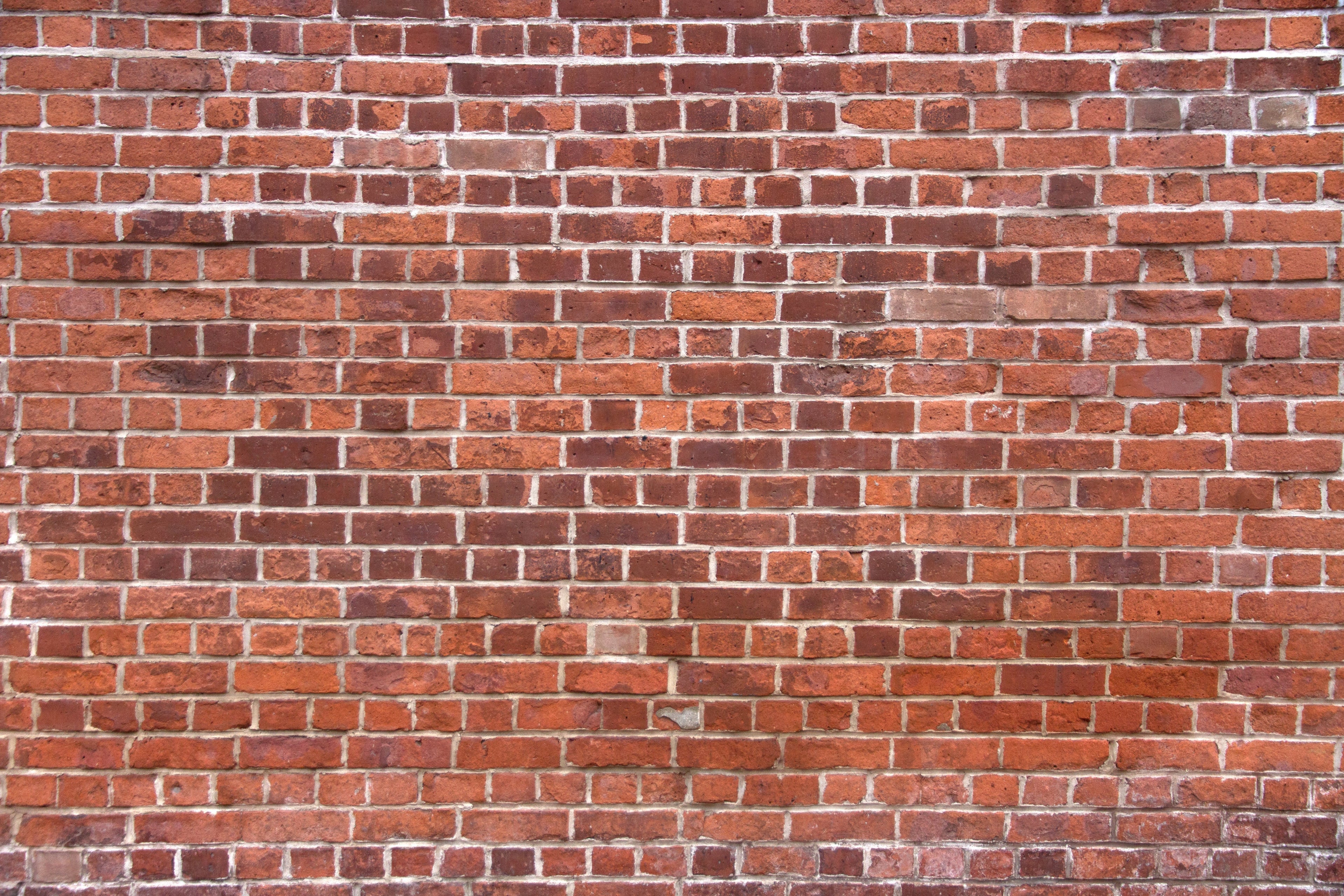 Red brick wall pattern design file showing detailed texture and natural color variations