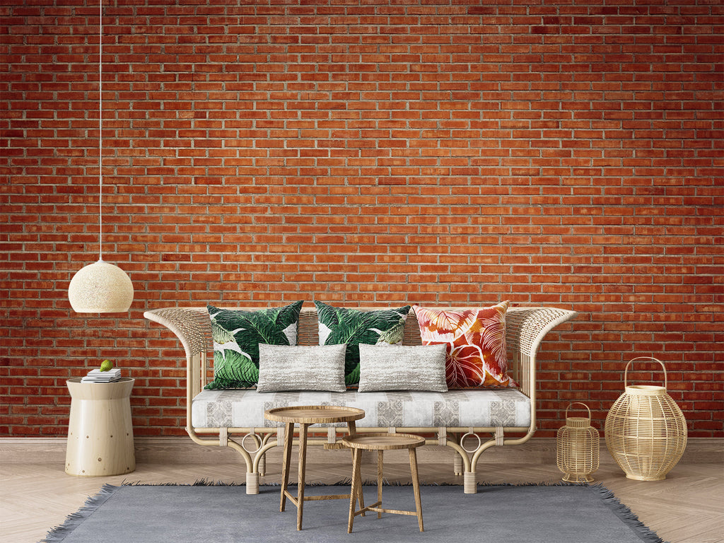 Brick effect wallpaper creating an urban loft feel in modern living room with gray sofa