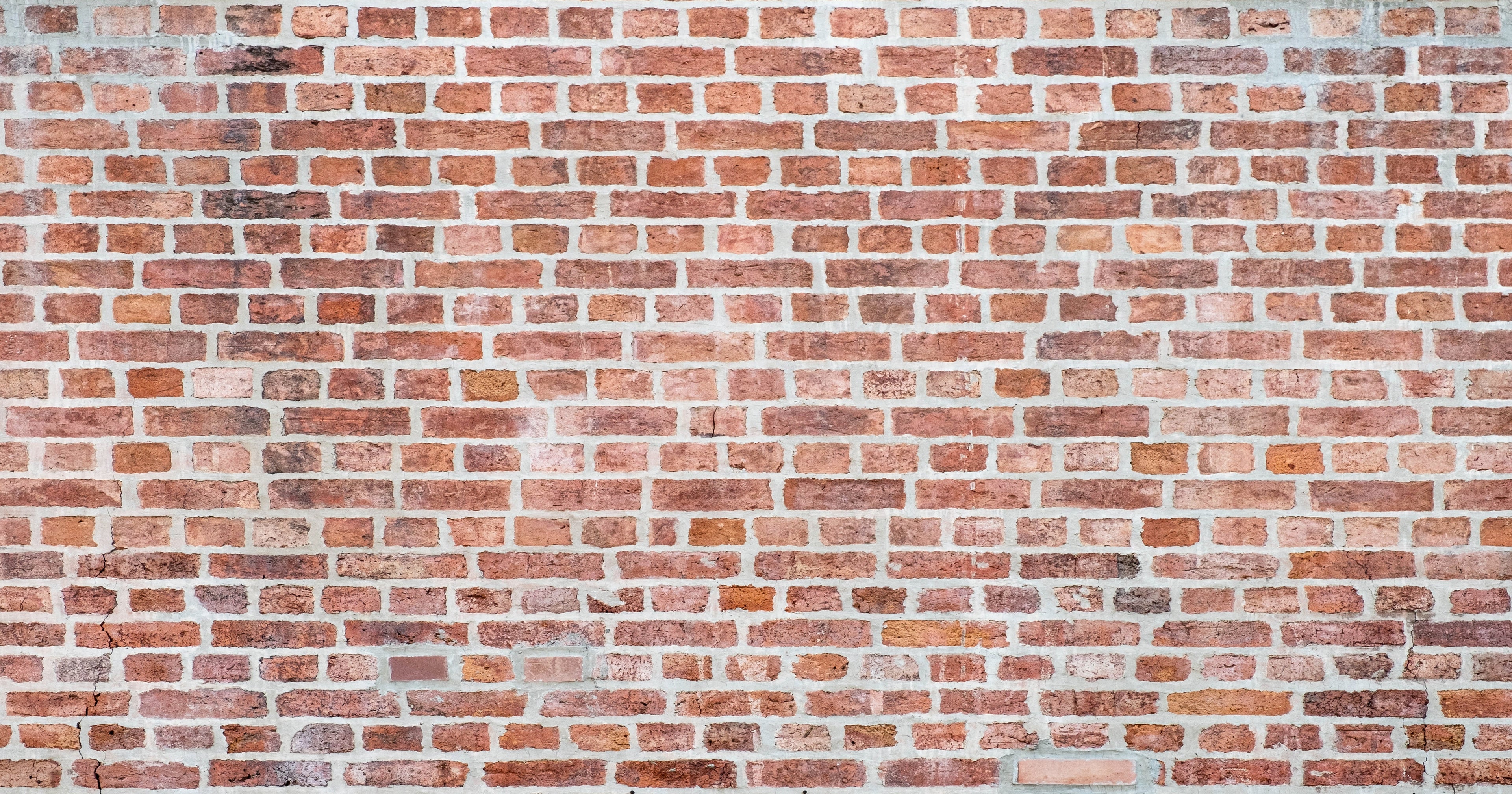 Design file of terracotta brick wallpaper showing detailed texture and color variations