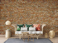 Brick wall mural in modern living room showcasing terracotta tones and industrial style