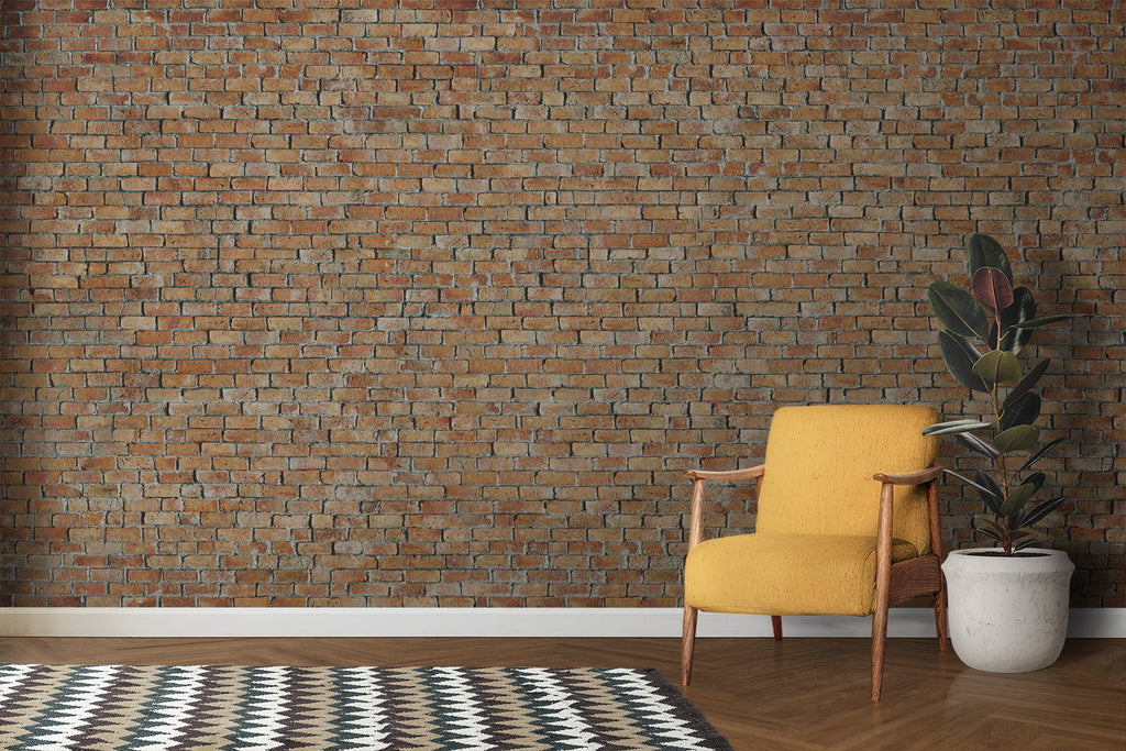 Terracotta brick mural wallpaper adding warmth to home office space