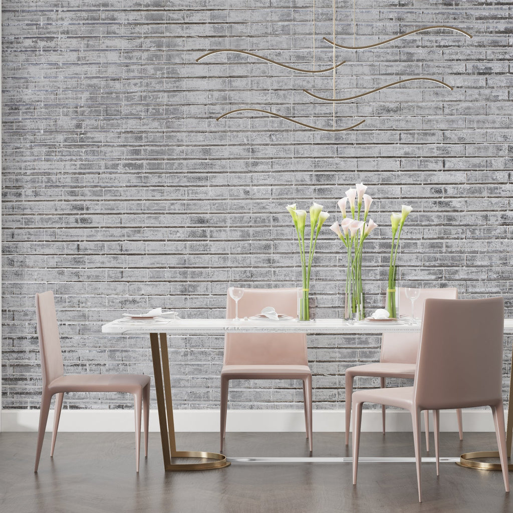 Industrial brick wallpaper showcased in modern dining room with natural light