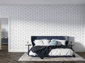 White brick mural wallpaper in modern living room showing clean industrial style and natural light
