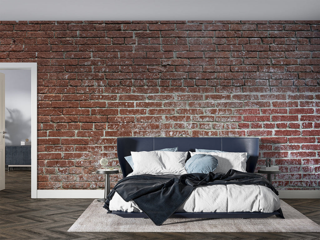 Industrial brick mural in kitchen backsplash area with stainless steel appliances