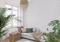 White brick wallpaper in modern living room with grey sofa and natural light