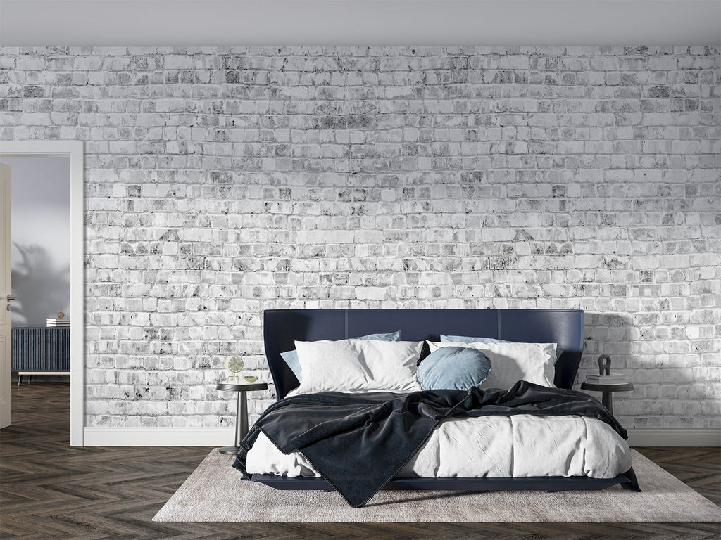 Whitewashed brick wallpaper in bright Scandinavian bedroom setting