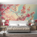 Cherry blossom wallpaper creating a serene atmosphere in a modern bedroom with white furniture and natural light