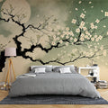 Japanese cherry blossom wallpaper creating a peaceful atmosphere in a modern minimalist bedroom with soft lighting