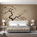 Cherry blossom wallpaper in modern minimalist living room, showing delicate beige floral pattern against white furniture