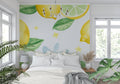 Citrus lemon wallpaper brightening a modern white kitchen with natural light