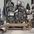 Modern living room with Comic City Wallpaper showing black and white urban design with yellow taxis, creating dramatic contrast