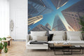 Modern skyscraper wallpaper shown in minimalist home office with white desk and black chair