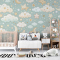 Cloud and star wallpaper in a cozy nursery with white crib, showing the perfect blend of mint green and golden stars