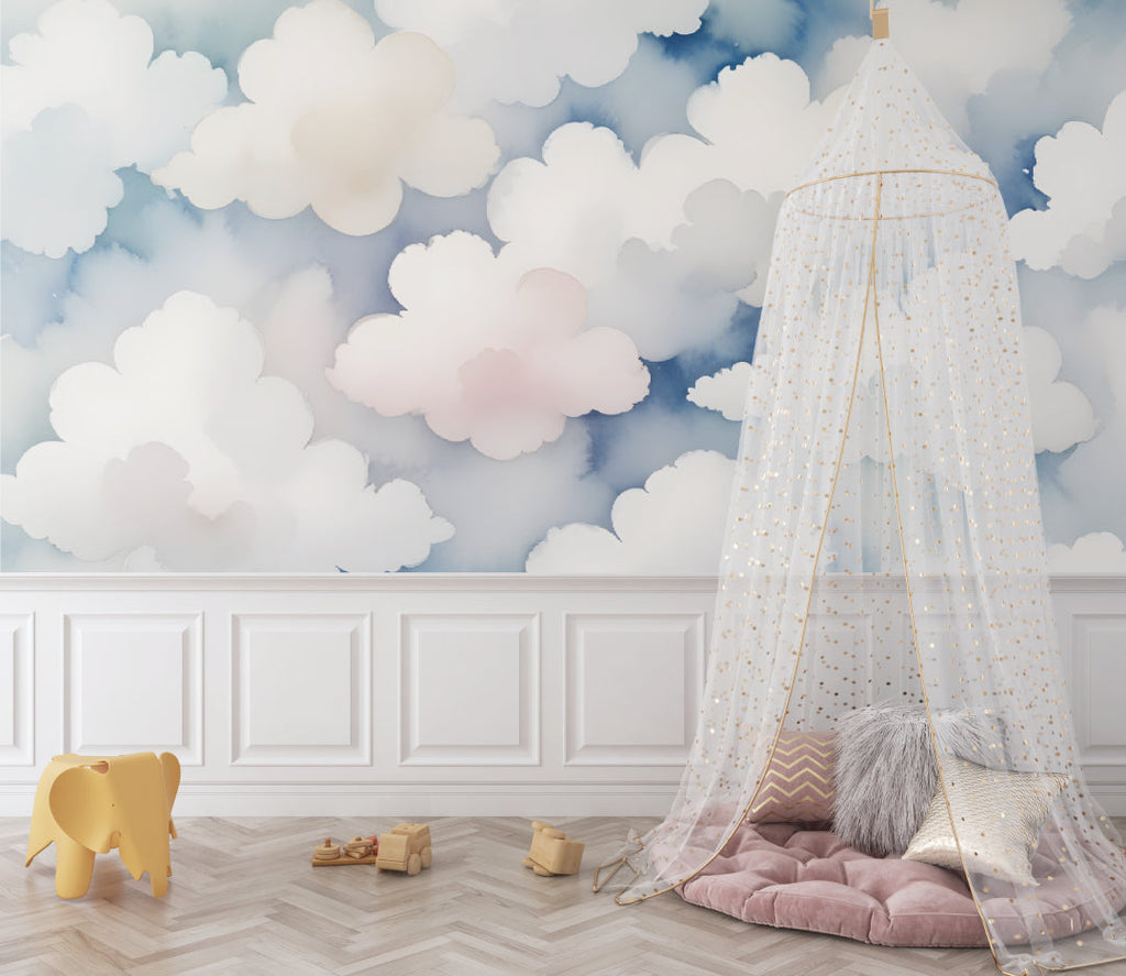 Cloud mural wallpaper bringing calm to a modern nursery with soft pink and blue tones