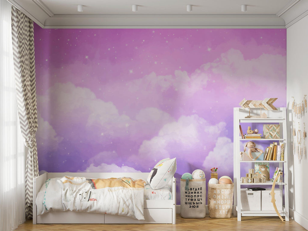Dreamy purple sky mural adding depth to a modern nursery with white furniture