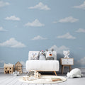 Cloud pattern wallpaper creating a peaceful atmosphere in a modern bedroom, soft blue sky design expanding the space